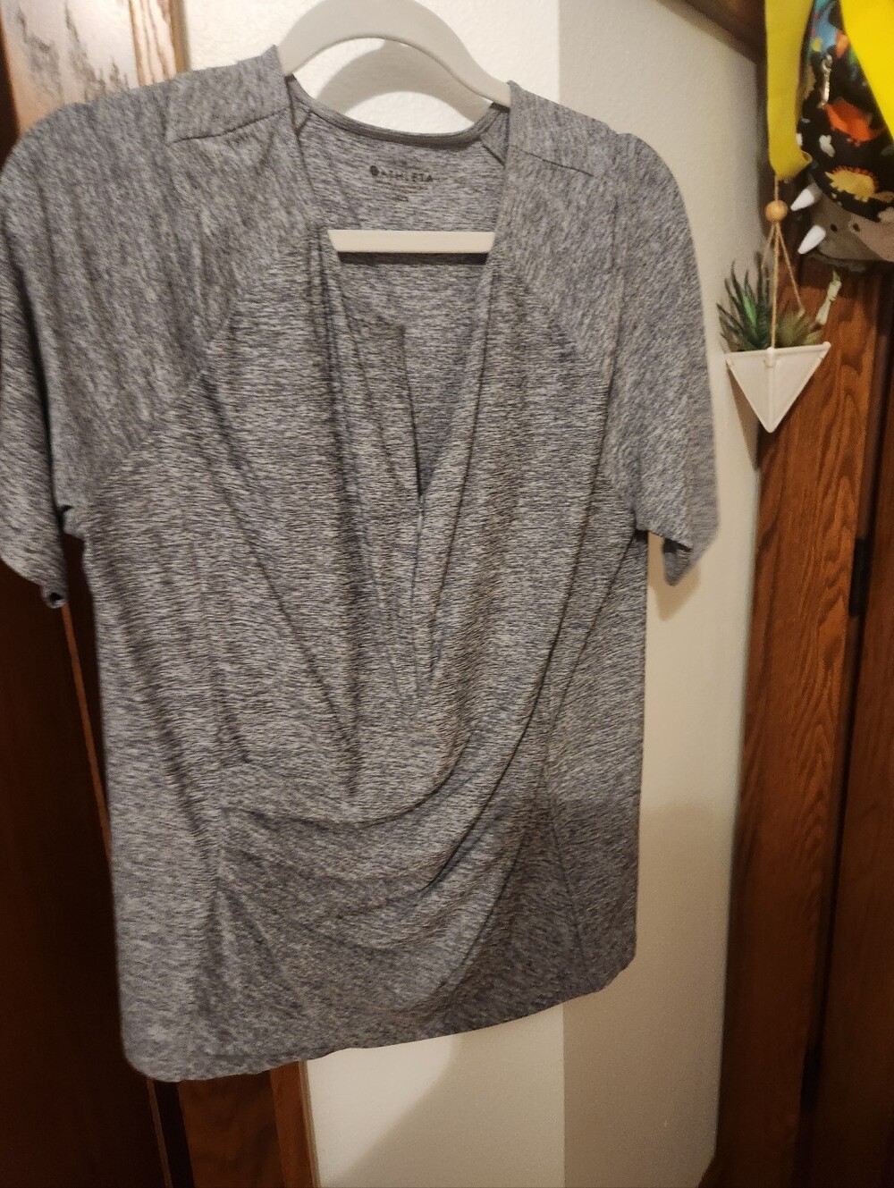 Heather Gray Athleta Women’s Top.  1/2 Zipper In Front.